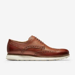 Men's Cole Haan Original Grand Wingtip Oxford - Woodbury Ivory -Fashion Shoes Store mens cole haan original grand wingtip oxford c26471 woodbury ivory side 29066.1622579041